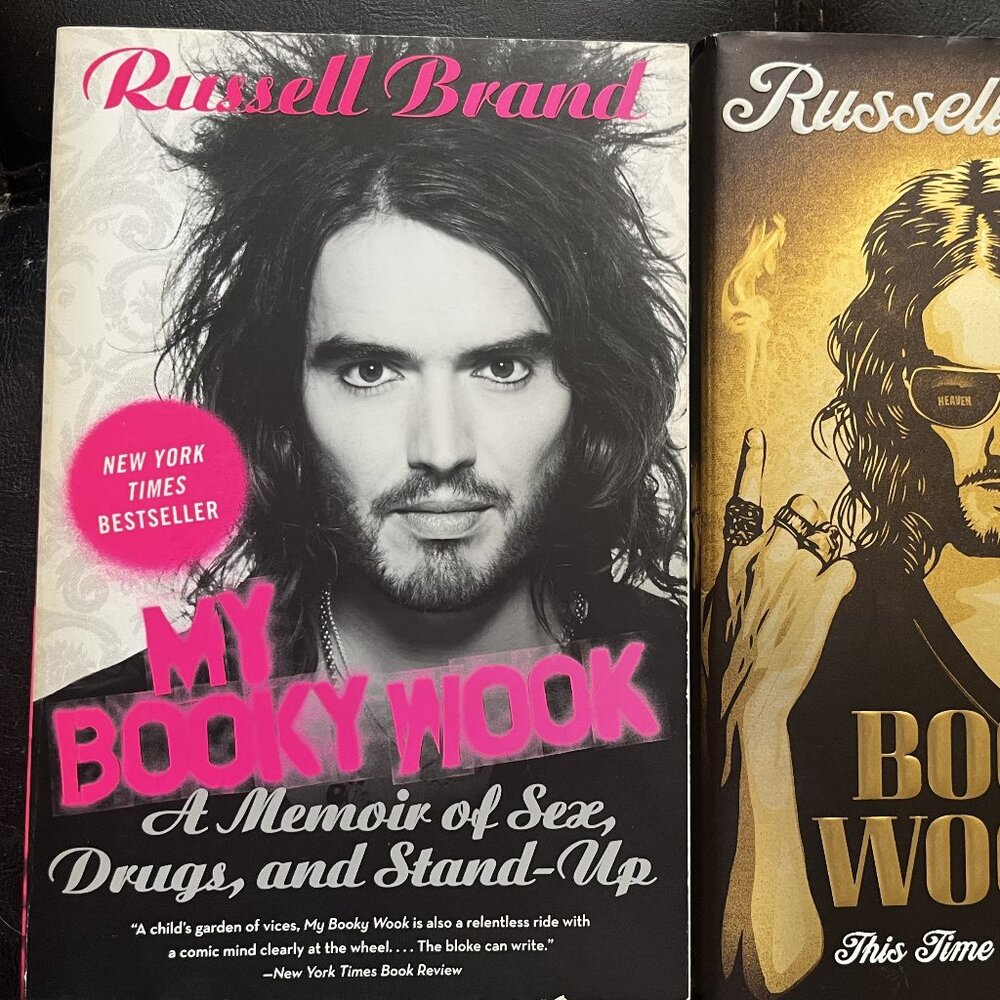 two Russell Brand booky wooks 1 and 2 number 2 is hard cover